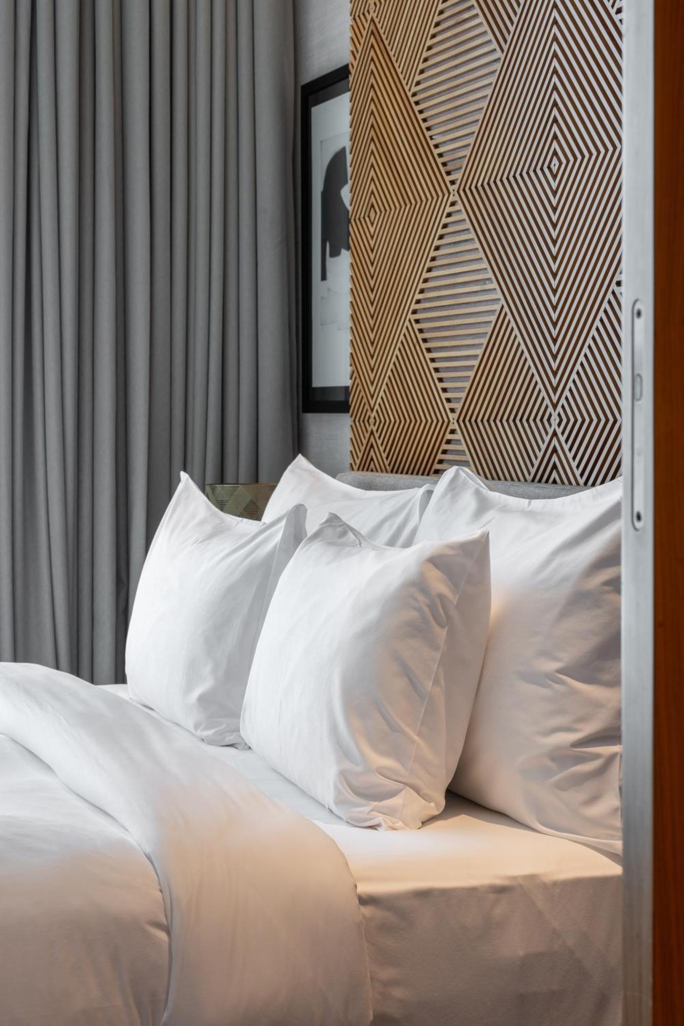 Shirvan Hotel City Yard Jeddah Exterior photo Pillows on a bed
